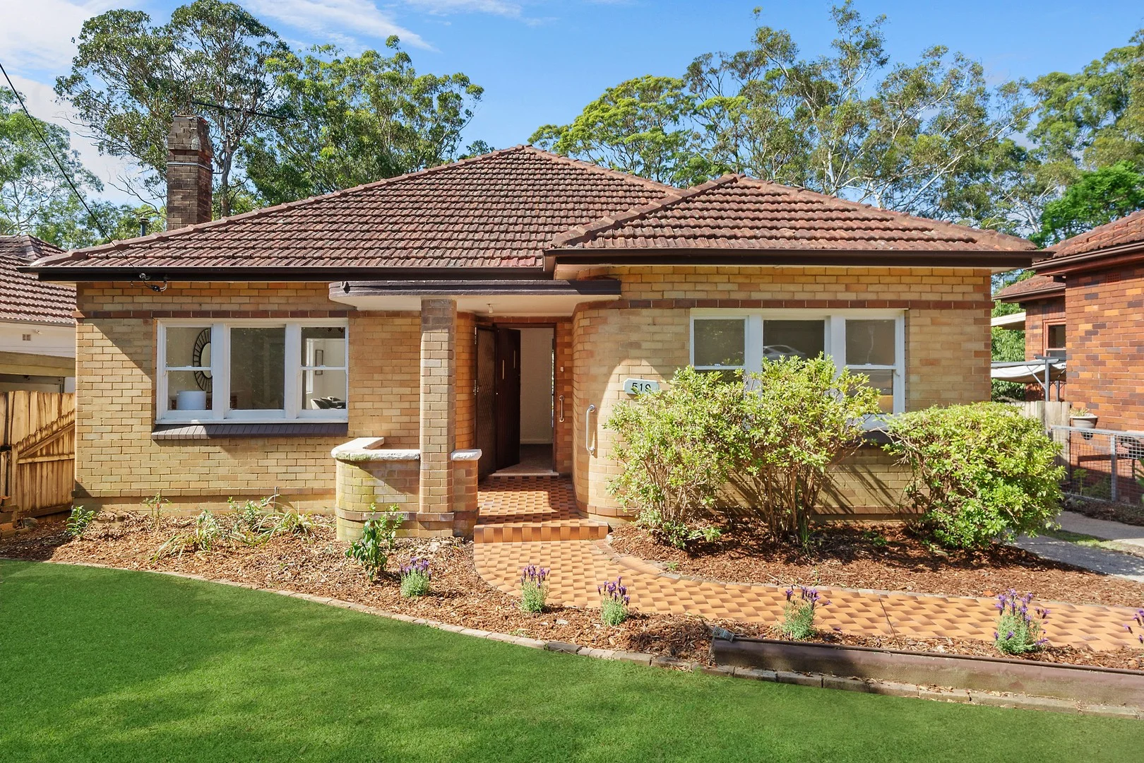 The house  ·  original 1970s brick